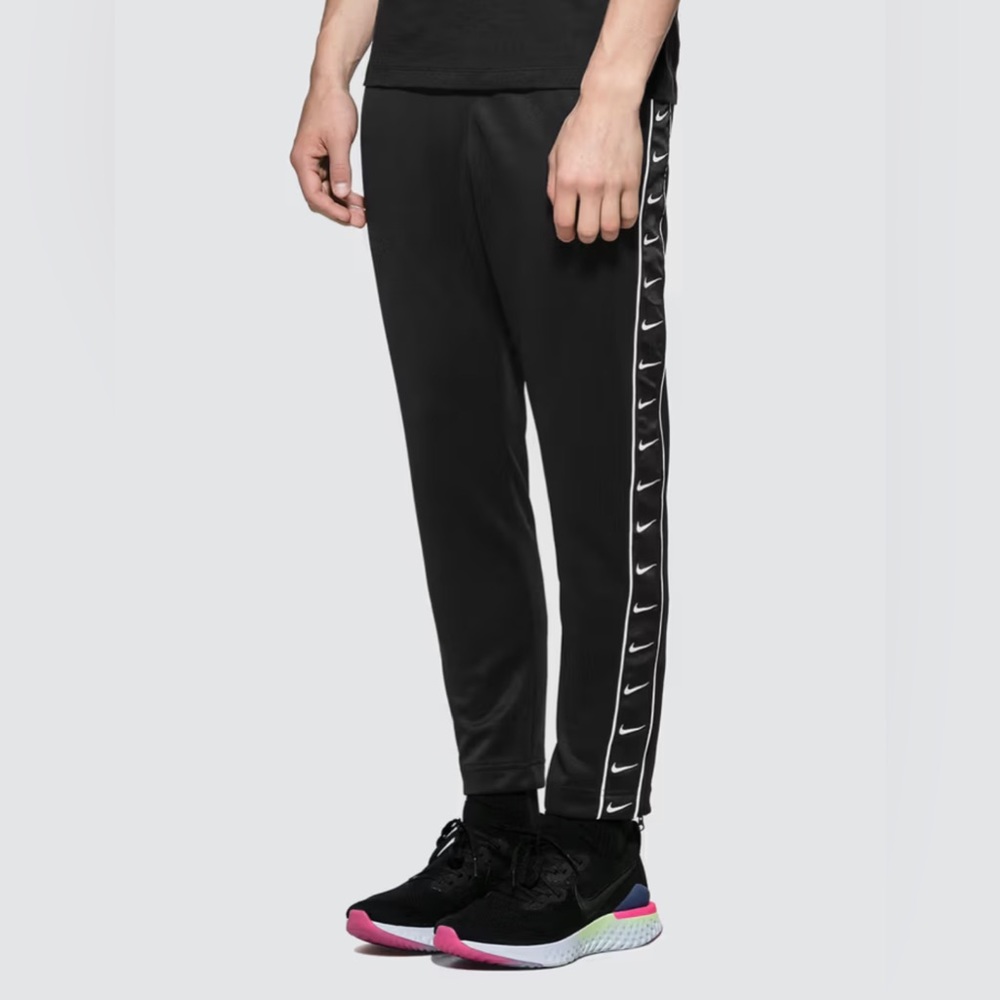 Nike swoosh tape woven track pants